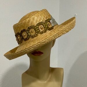 Attractive straw hat with gold and silver trim